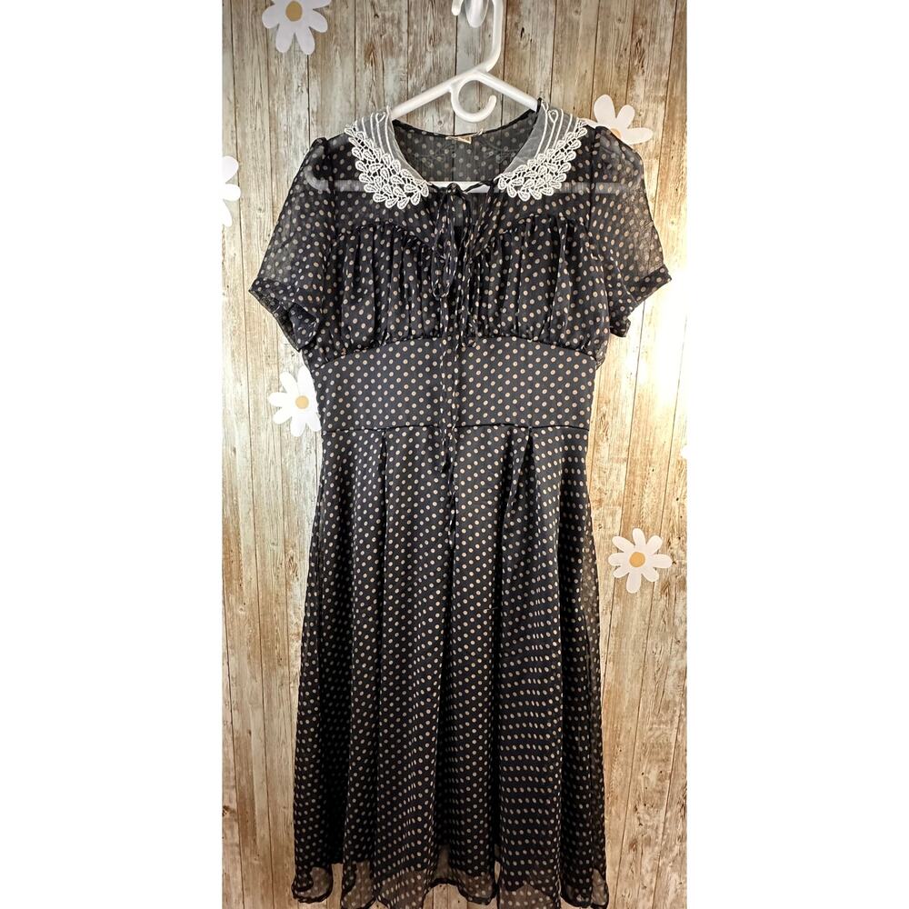 Elegant Black Polka Dot Dress with Lace Collar